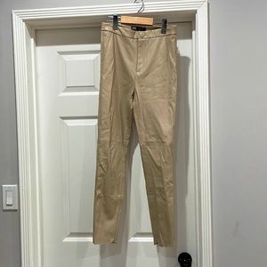 Neutral faux leather pants